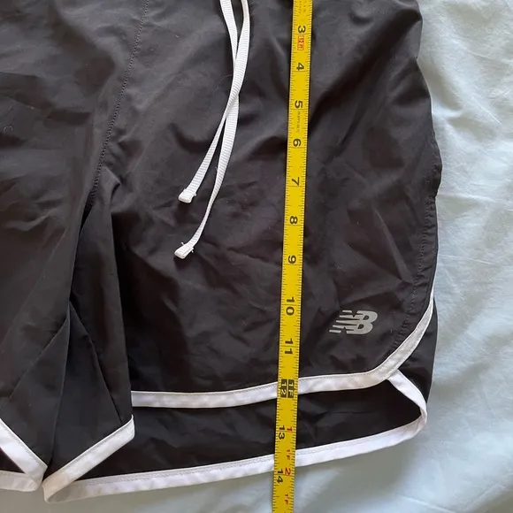 Never worn: New Balance black &amp; white running shorts