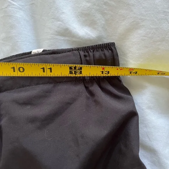 Never worn: New Balance black &amp; white running shorts
