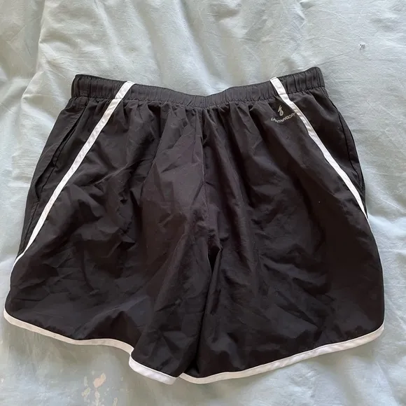 Never worn: New Balance black &amp; white running shorts